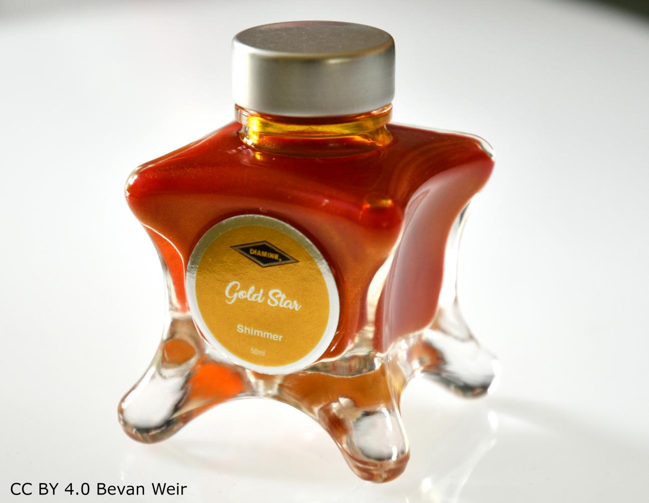 a bottle of Diamine Gold Star fountain pen ink